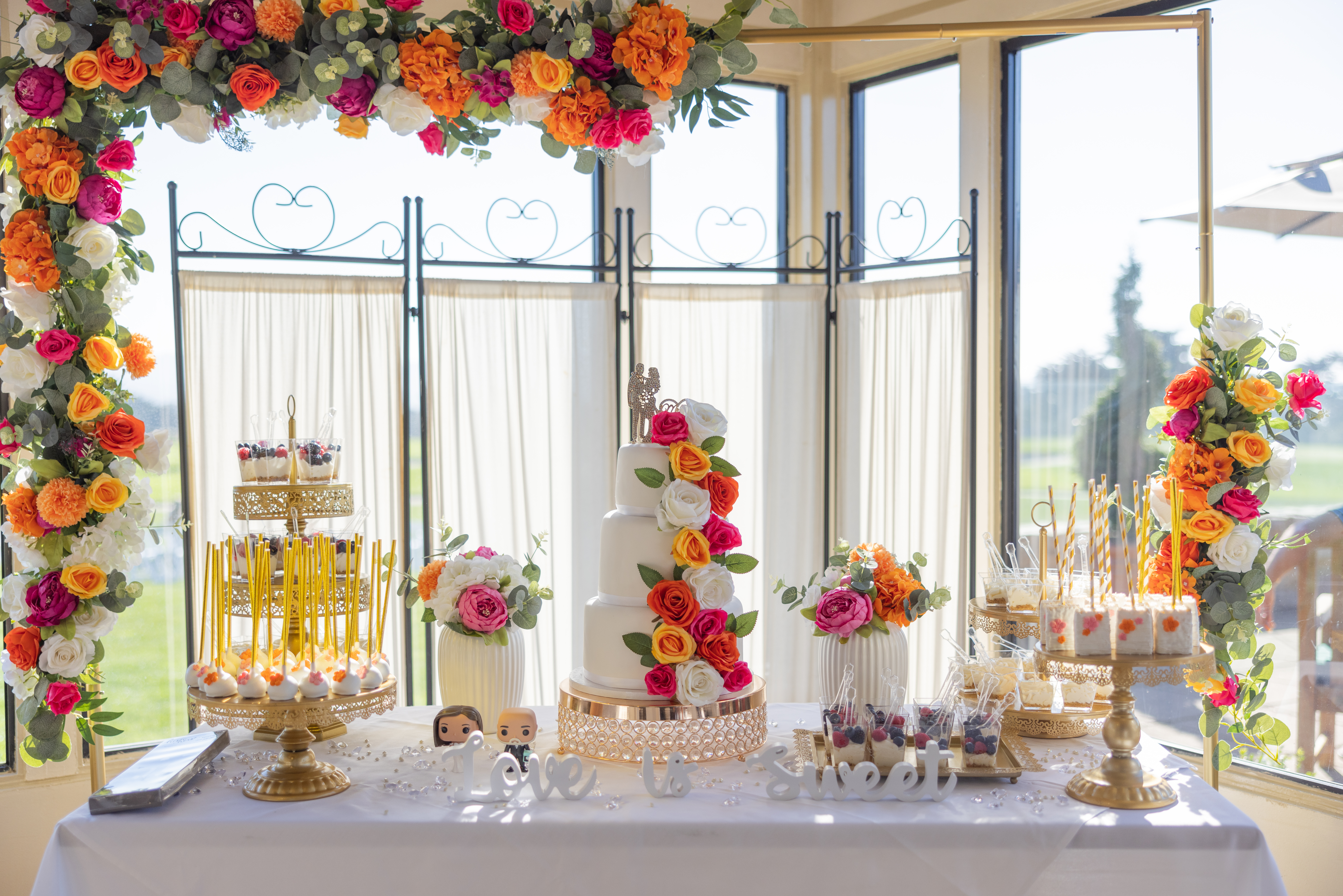 Wedding Buffet Dessert Table with Flowers